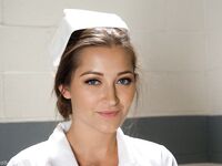 Gorgeous nurse with a nice butt Dani Daniels strips and poses in high heels