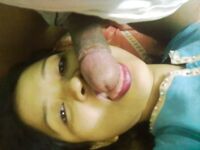 Indian wife changes attire while pleasuring her husband on bed POV style