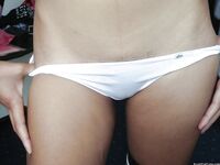 Young asian girl exposing her tiny tits and trimmed juicy cunt