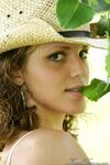 Teen amateur Karen lets denim skirt ride up to expose her underwear in yard