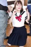 Japanese schoolgirl spits out cum after sucking off two cocks
