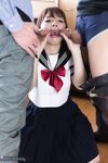 Japanese schoolgirl spits out cum after sucking off two cocks