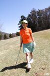 Japanese golfer Nana Kunimi flashes no panty upskirt while lining up a putt
