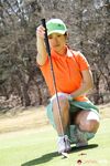 Japanese golfer Nana Kunimi flashes no panty upskirt while lining up a putt