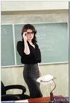 Sexy American teacher strips at the office & shows her big tits and pink holes