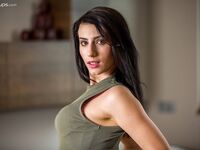 Slutty brunette Nelly Kent sheds short dress to expose her small tits