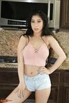 Asian solo girl Jade Kush slides panties aside after baring big boobs