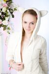 Sexy bunny Belonika in pigtails strips to show her bald teen pussy closeup