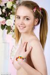Sexy bunny Belonika in pigtails strips to show her bald teen pussy closeup