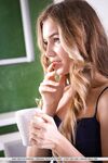 Hot blonde teen Mary Rock flashes a no panty upskirt before getting naked