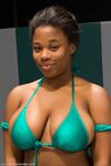 Ebony Yasmine Loven and MILF Sara Jay flaunt their big tits and wrestle