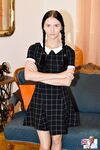 Pigtailed Crystal Greenvelle hikes her skirt to reveal shaved teen pussy
