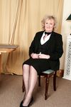 Granny in hot stockings Keanne reveals her natural tits and poses