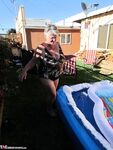 Fatty mature granny Girdle Goddess peels to enjoy wading pool skinny dip