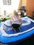 Fatty mature granny Girdle Goddess peels to enjoy wading pool skinny dip