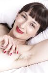 Amateur brunette with red lipstick Destine fingering her hairy pussy