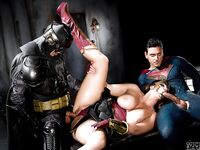 Buxom pornstar Alison Tyler giving Batman and Superman blowjobs