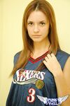Young cheerleader Amy lifts her uniform to tease with sexy panties & underboob