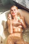 Playful teen Nancy washing her exotic body and pussy in the bathtub