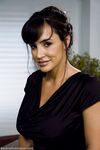 Sexy teacher Lisa Ann gets a hard spanking while making out with a student