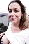 Horny granny Eva Jayne gets cum on her face after a gangbang in a field