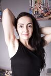 Older first timer Di Devi parts her hairy pussy wide open after disrobing