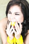 Gorgeous amateur submissive Mai Ly ball gagged & tied up for painful tit play