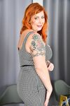 Fat redhead Tammy Jean stretches out her cunt during her nude premiere