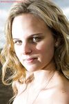 Blonde amateur Kristal heads outdoors to bare her naked MILF body