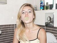 Young cutie Zoey Ryder bares her tiny tits and blows bubbles on the toilet