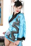 Amateur Asian babe in kimono spreading her freshly shaved pussy