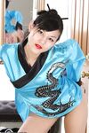 Amateur Asian babe in kimono spreading her freshly shaved pussy