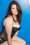 Sexy thick chick Katie poses in hot lingerie before stripping to bare her tits
