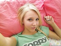 Cute blonde teen snaps self shots of her bare boobs in cutoff jean shorts