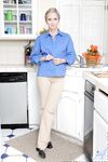 Mature housewife Annabelle Brady washing her hungry pussy in the kitchen sink