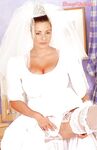 Busty bride Linsey Dawn McKenzie does some rubbing before the wedding.
