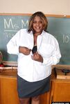 Mature ebony teacher SSBBW Winxx is undressing in the classroom