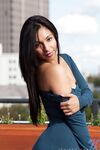 Very sexy Latina in tight dress and boots shows her smooth pussy in public