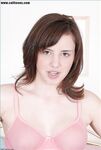 Girl next door type fondles her firm tits before playing with her teen pussy