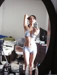 Playful Asian babe Lana Selfshot demonstrating trimmed pussy and fingering
