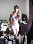 Playful Asian babe Lana Selfshot demonstrating trimmed pussy and fingering