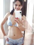 Playful Asian babe Lana Selfshot demonstrating trimmed pussy and fingering