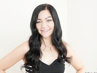Cute brunette Karly Baker in braces masturbating pussy naked with vibrator