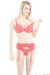 Hot blonde Natalia Starr poses topless in sexy red garter & sheer stockings