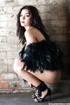 Beautiful centerfold babe Alexandra Tyler posing in hat and furs