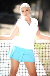 Platinum blonde chick Britney Amber hikes tennis skirt over her ass and twat