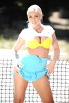 Platinum blonde chick Britney Amber hikes tennis skirt over her ass and twat
