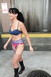 Naughty mature Aunty Kathy flaunts outdoors in boots and lingerie