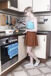 Amateur teen Abby shows off her hairy pussy & armpit in the kitchen