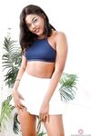 Ebony solo girl Yara Skye flashes her bare ass prior to stripping naked